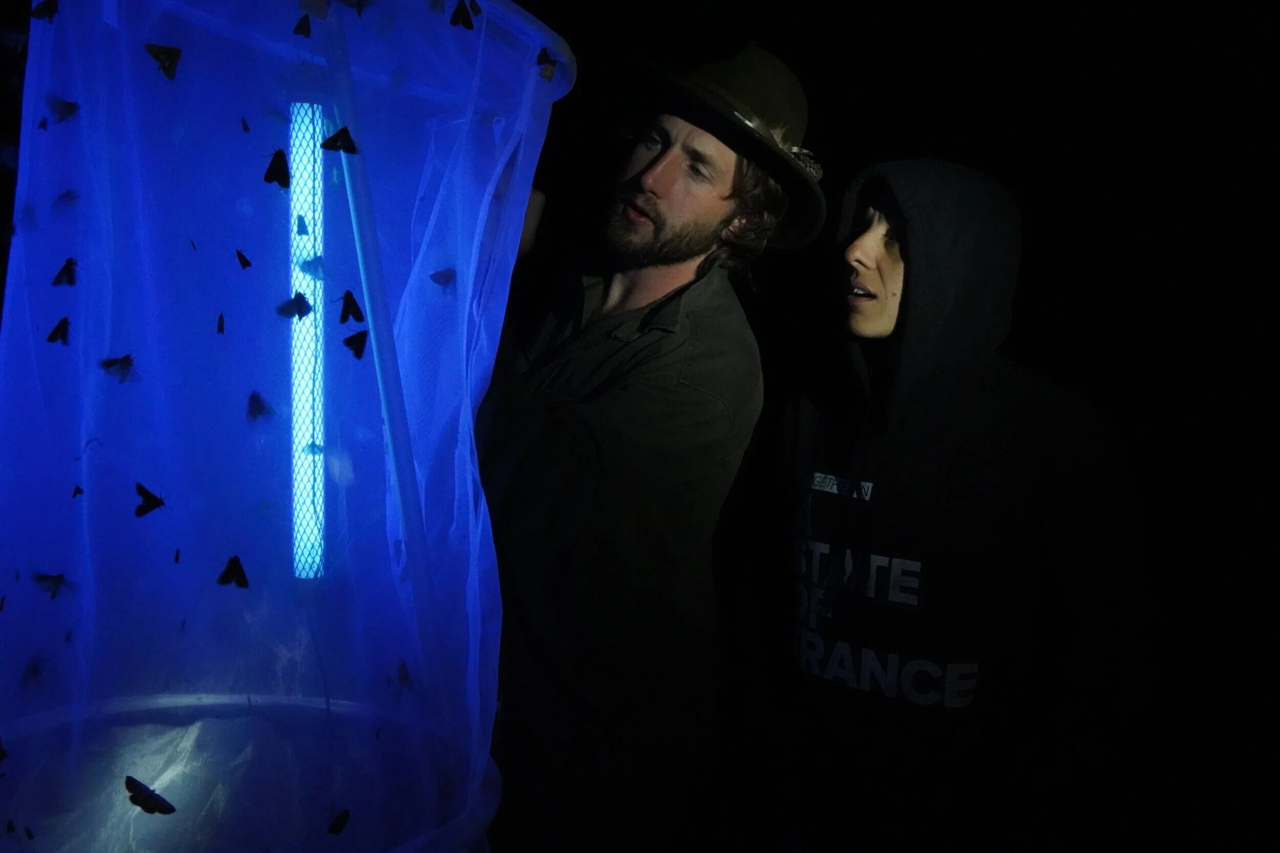 Tom with a UV light moth trap at night